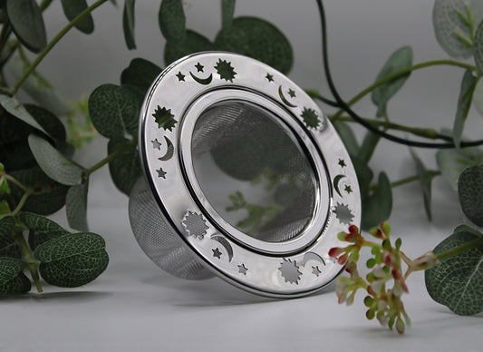 Colador de té sol, luna, estrellas